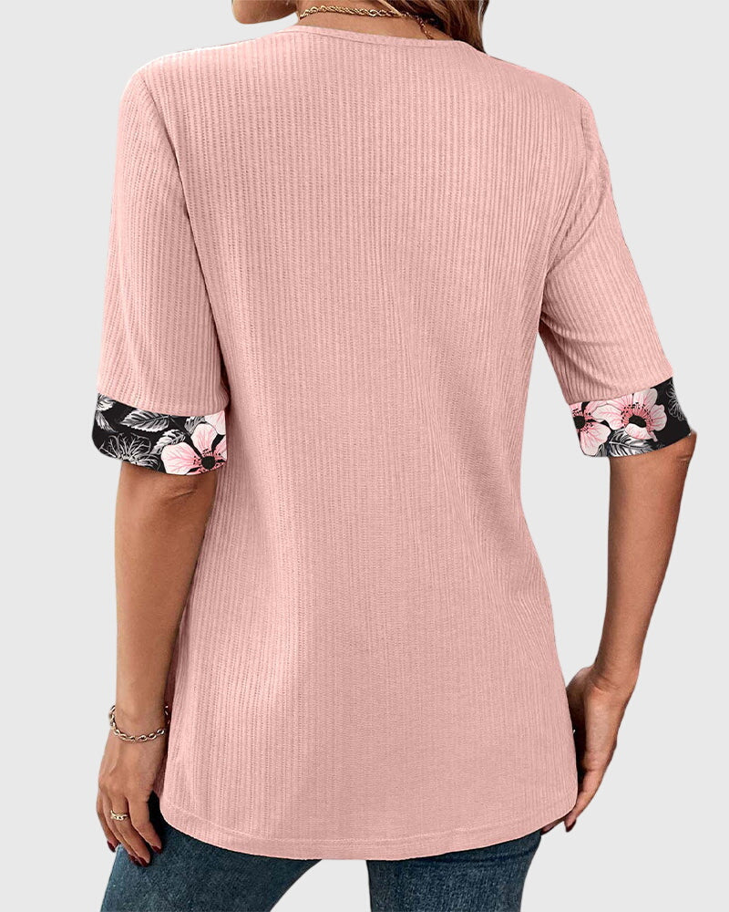 Elegant blouse with floral print panels